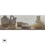 Rustic display of gray–blue ceramic pottery: bowls, plates, baskets, and a large glazed bottle on a weathered wooden surface