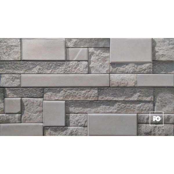 Gray stone wall with rectangular, textured blocks arranged in a staggered pattern