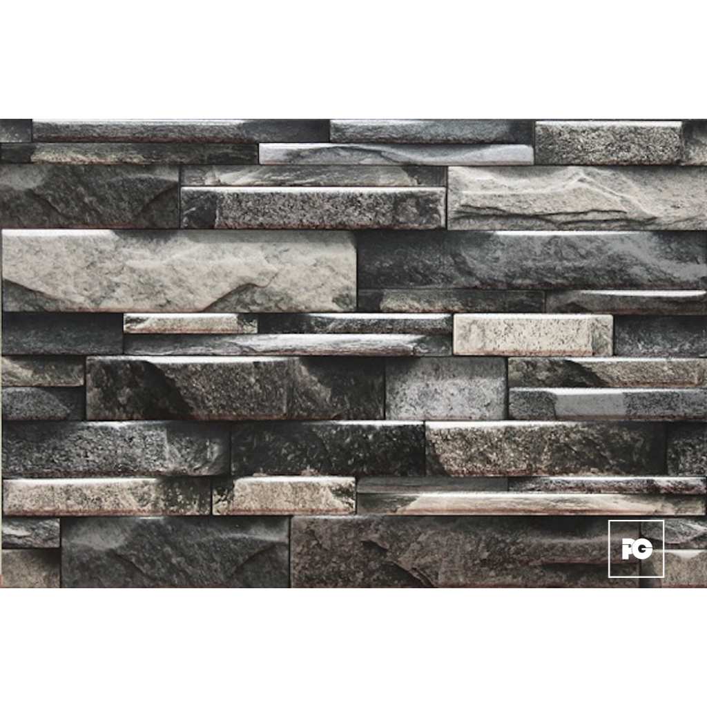 Gray stacked-stone wall veneer with irregular rectangular stones in varying shades of gray to create a textured facade.