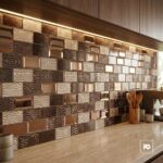 Malla decorativa de vidrio hannah 30 x 30 cm-tiles-2-ok | Plomería García Copper-toned embossed tile backsplash with varied textures above a beige countertop; a wooden utensil holder sits on the counter in a kitchen.