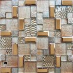 Malla decorativa islandia de vidrio acero inoxidable y resina 30 x 30 cm-tiles-ok | Plomería García Metallic square tile mosaic with gold bronze bars and varied textured patterns in a geometric grid.