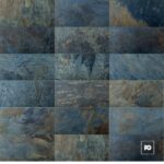 Blue-gray slate tile mosaic arranged in a grid pattern with a white pg logo in the bottom-right corner.